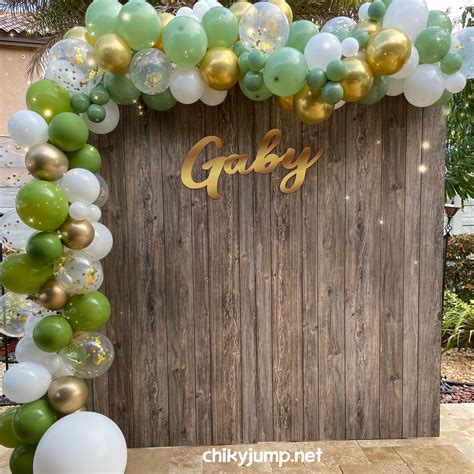 Wood Backdrop And Balloons Chikyjump Party Rental