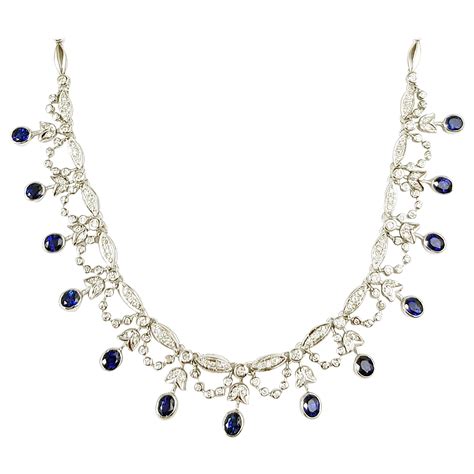 Blue Sapphire With Diamond Necklace Set In 18 Karat White Gold Settings