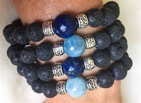 One Elegant Unisex Black 10 Mm Volcanic Lava Beaded Bracelet With Lapis