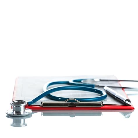 Premium Photo Stethoscope With Red Medical Clipboard