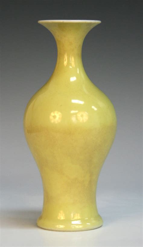 A Chinese Imperial Yellow Monochrome Glazed Vase Probably Yongzheng Period Of Baluster Form With T