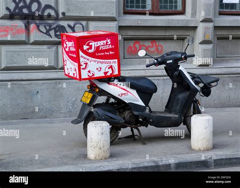 Jerry's Pizza delivery scooter Stock Photo - Alamy