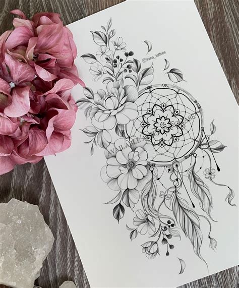dream catcher thigh tattoo 8