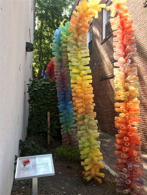 diy plastic bottle arch pool noodle art installation colorful