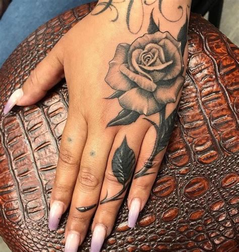 Inked Magazine On Instagram “lovely Rose Hand Tattoo By Tattoosbyniz 🌹 ⁠ ⁠ Tap The Link In Bio