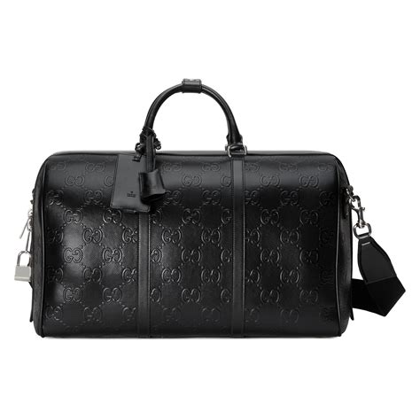 Gucci Gg Embossed Duffle Bag In Undefined Modesens