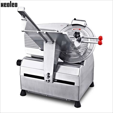 An Electric Meat Slicer Is Shown On A White Background With The Words