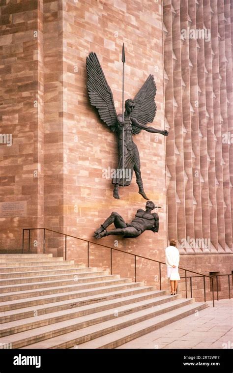 Woman Standing Looking At Sculpture Coventry Cathedral Church West