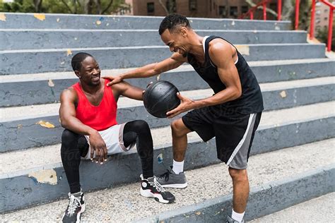 "Two Friends Playing Basketball Together" by Stocksy Contributor ...