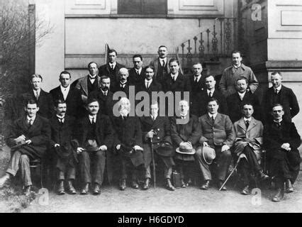 Members of the first Dail in 1919, with Michael Collins (second left ...