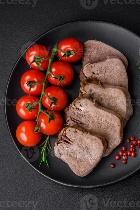 Delicious Boiled Beef Tongue Sliced With Vegetables And Spices 23443204