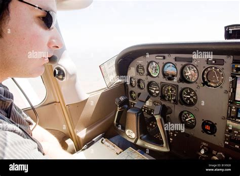 Pilot Flying A Cessna 172 Stock Photo Alamy