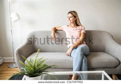 Nice Blond Women Sit On Sofa Foto De Stock 1167347902 Shutterstock