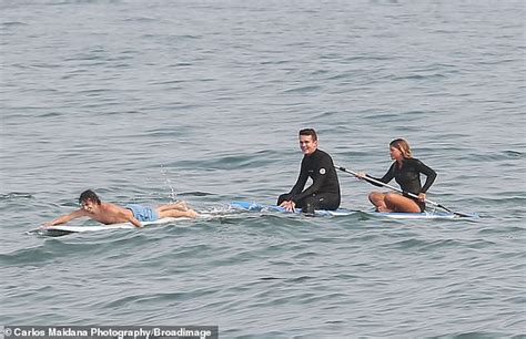 Sofia Richie Showcases Her Curves In A Striped Bikini Before Transforming Into A Surfer Babe