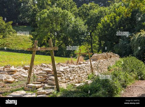 A Cotswold Dry Stone Wall In The Process Of Being Built A Traditional