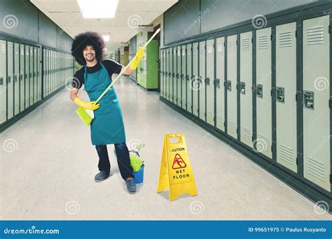 Male Janitor Playing A Broom In The School Stock Image Image Of