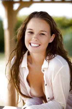 Smiling Cutie Shows Us A Tanline Porn Pic