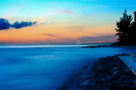 Blue And Pink Foggy Beach Sunset Stock Image Image Of Island