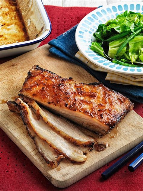 Slow Roasted Pork Belly With An Orange  License Image 11316659 Image Professionals