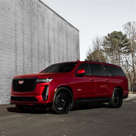 Humongous Or Not A Burgundy Caddy Escalade V Esv Feels Prim Proper On 28s Autoevolution