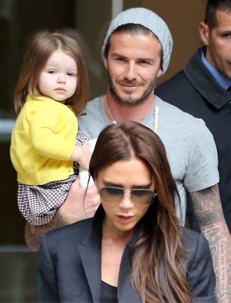 David Beckham with Harper Seven and Victoria after celebrating his 38th ...