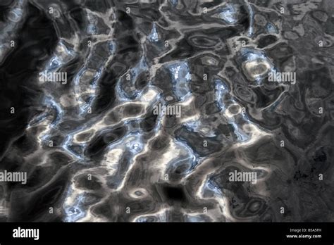 sun light reflection waves  lake water surface stock photo alamy