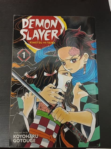 Demon slayer manga volume 1, Hobbies & Toys, Books & Magazines, Comics ...