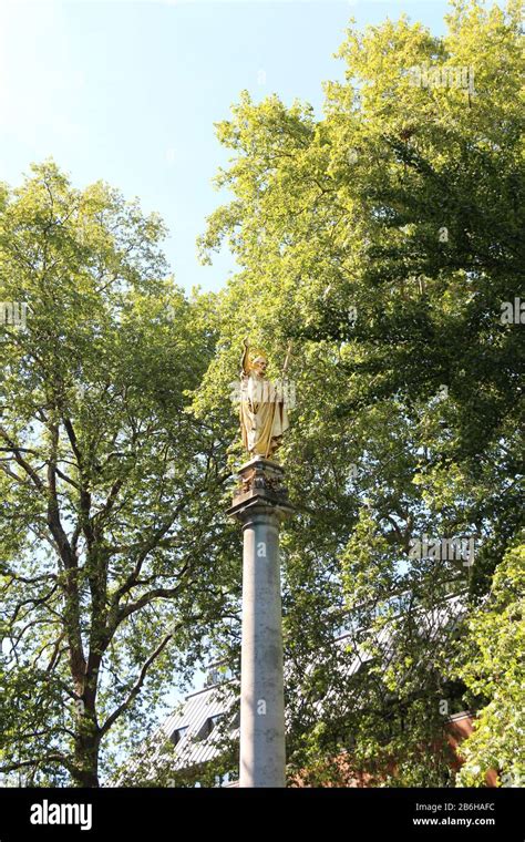 Gilt statue of Saint Paul at the top of St Paul's Cross in the ...