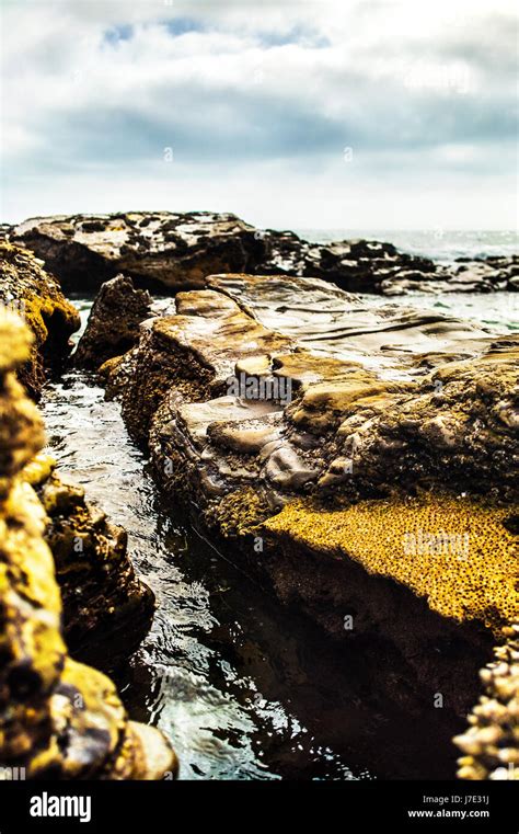 Rock Wall Formation On A Gloomy Sky Stock Photo Alamy