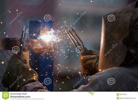 Welder Worker Welding A Wide Metal Pipe Tube With A Oxy Fuel Cutting