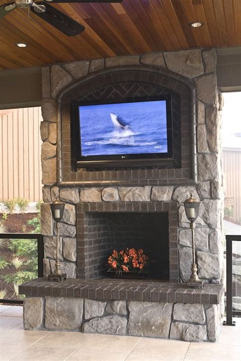 Pros And Cons Of Mounting A Tv Over A Fireplace Outdoor Gas Fireplace Patio Fireplace Outdoor