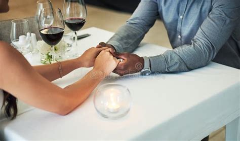 Love Date And Couple Holding Hands In Restaurant For Romantic Dinner Celebration And