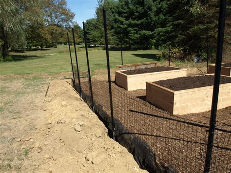 Garden Fence Installation Project with In ground Rodent protection ...