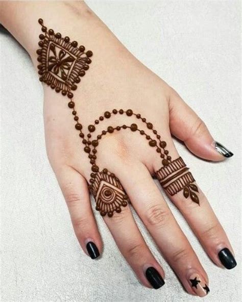 Back Hand Fingers Mehndi Designs