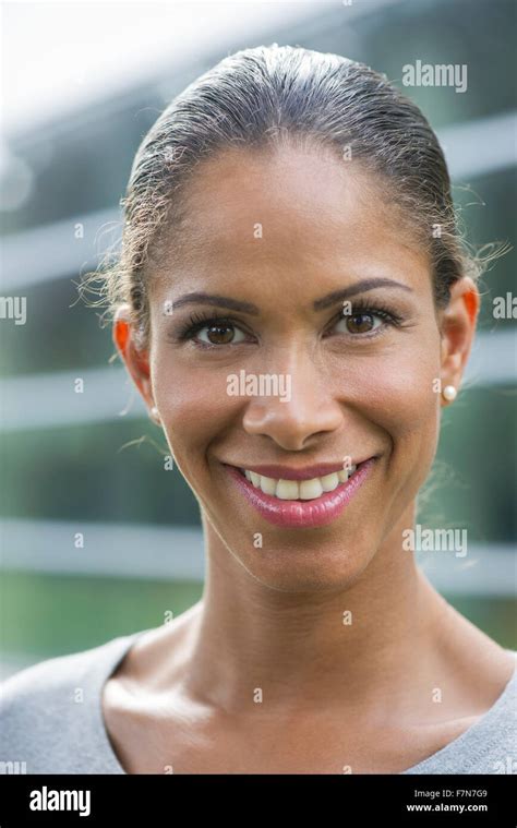 Woman smiling, portrait Stock Photo - Alamy