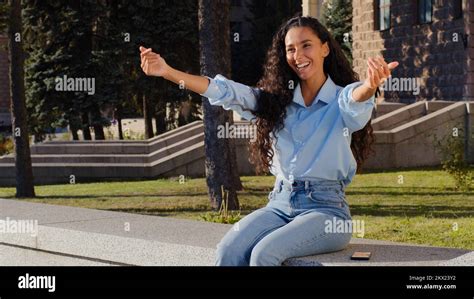 Young Beautiful Brunette Girl Woman Smiling Waiting Sitting In City