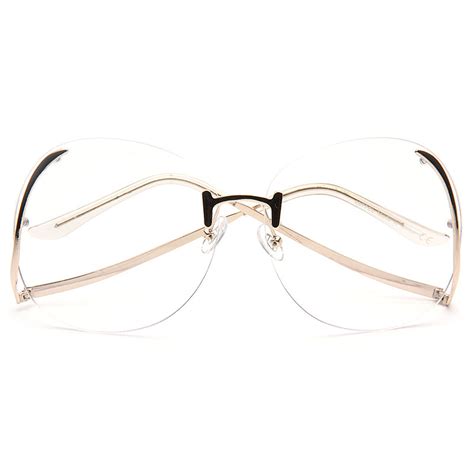 Flutter Oversized Rimless Low Temple Clear Glasses Cosmiceyewear