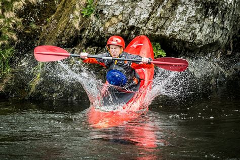 The Canoe And The Water Rapids Riders Sports