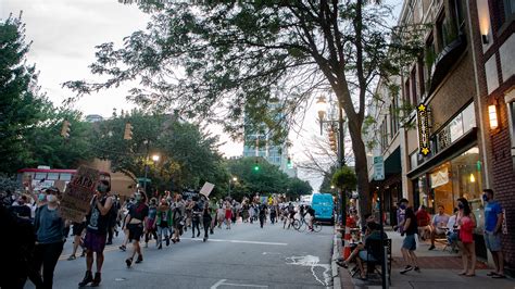 Asheville officials support 'divesting' in police; Clashes over details