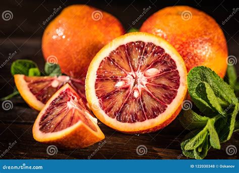 Whole And Cut Ripe Juicy Sicilian Blood Oranges Stock Photo Image Of