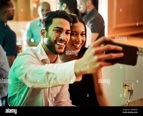 Making Memories Two Cheerful Young Friends Taking A Self Portrait