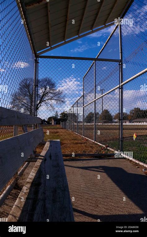 Softball bench in the dugout Stock Photo - Alamy