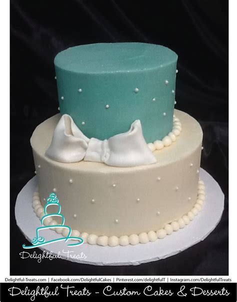 Two Tier White And Teal Birthday Cake With Edible Pearls And Fondant