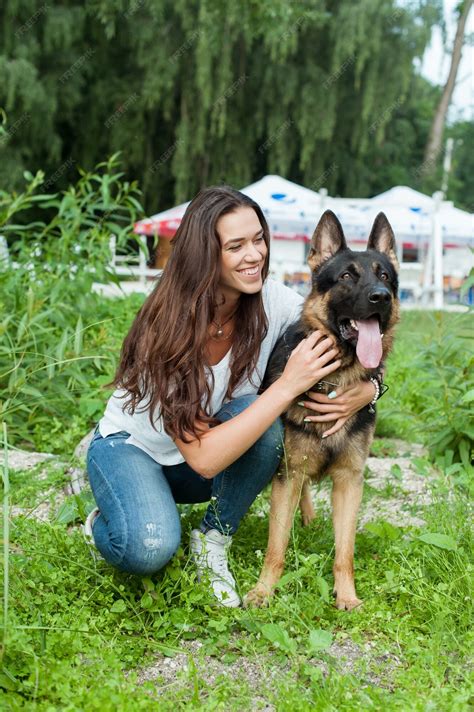 Premium Photo | The girl and her gorgeous german shepherd