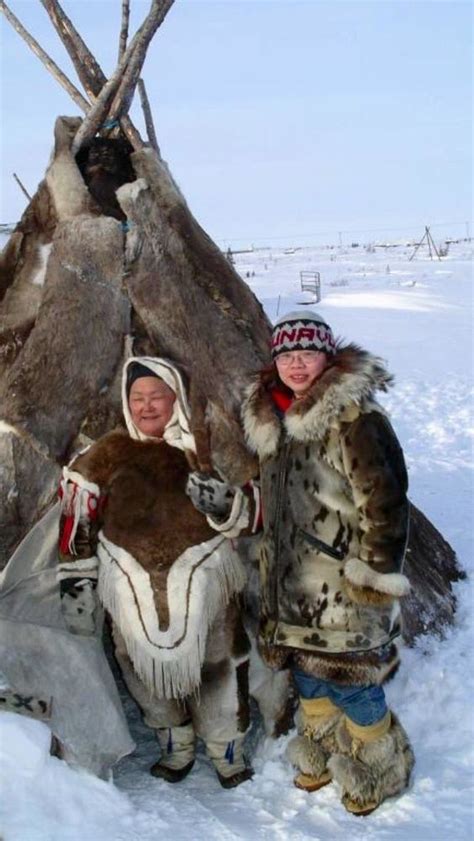 “A mother with her daughter in front of the tipi, inuit tribe - Alaska ...