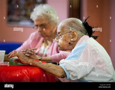 2 Women Seniors S At A Senior Center In Ardmore PA Playing Bingo Stock