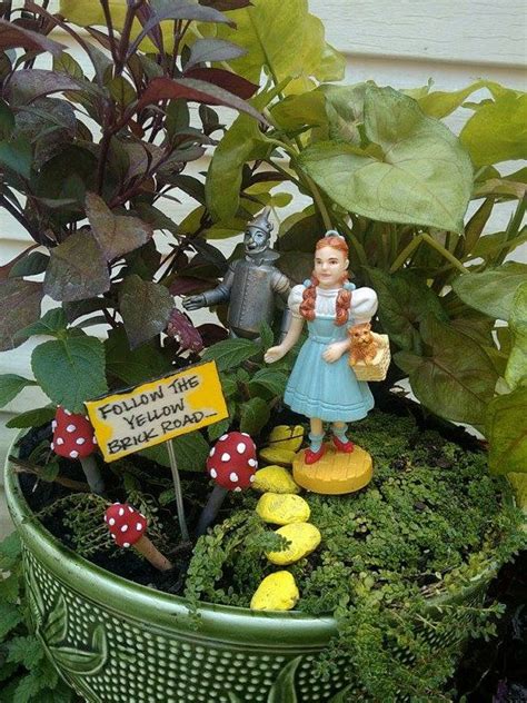 Wizard Of Oz Miniature Sign That Reads Follow The Yellow Brick Road