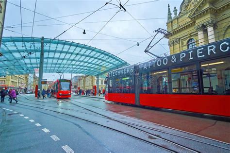 Modern Trams Run On Bubenbergplatz At Bahnhofplatz Station In Bern