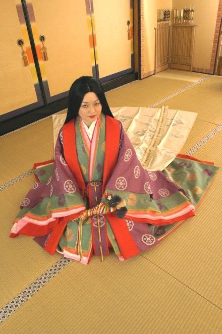 A Woman Dressed In Junihitoe At A Kimono Photography Experience