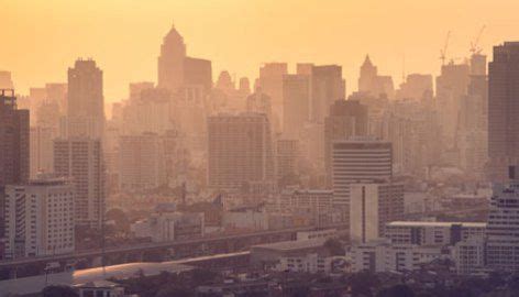 A City Skyline With Tall Buildings In The Foreground